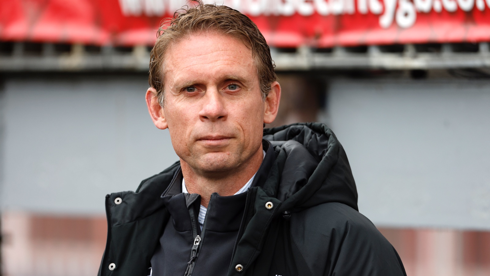 England's new defence coach Brett Hodgson looks on