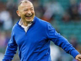 New Wallabies head coach Eddie Jones laughs before a match. australia