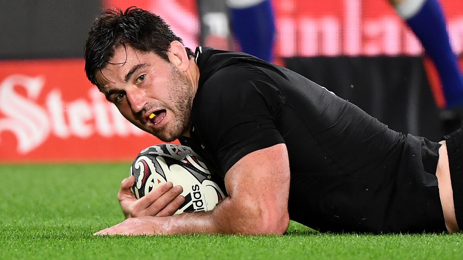 All Blacks Luke Jacobson scores a try.