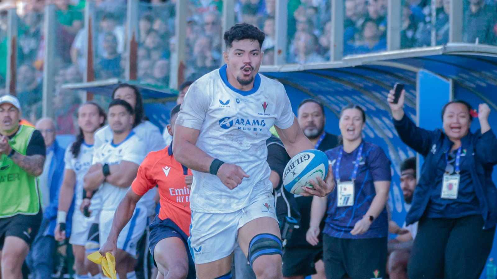 Samoa's Theo McFarland on the charge.