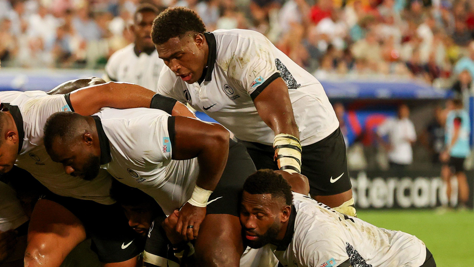 Fiji pack down for scrum against Wales.