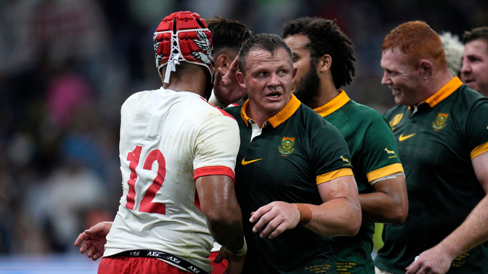 Deon Fourie and Pita Ahki shake hands at the end of Rugby World Cup Pool B match between South Africa and Tonga at the Marseille's Stade Velodrome, in Marseille, France