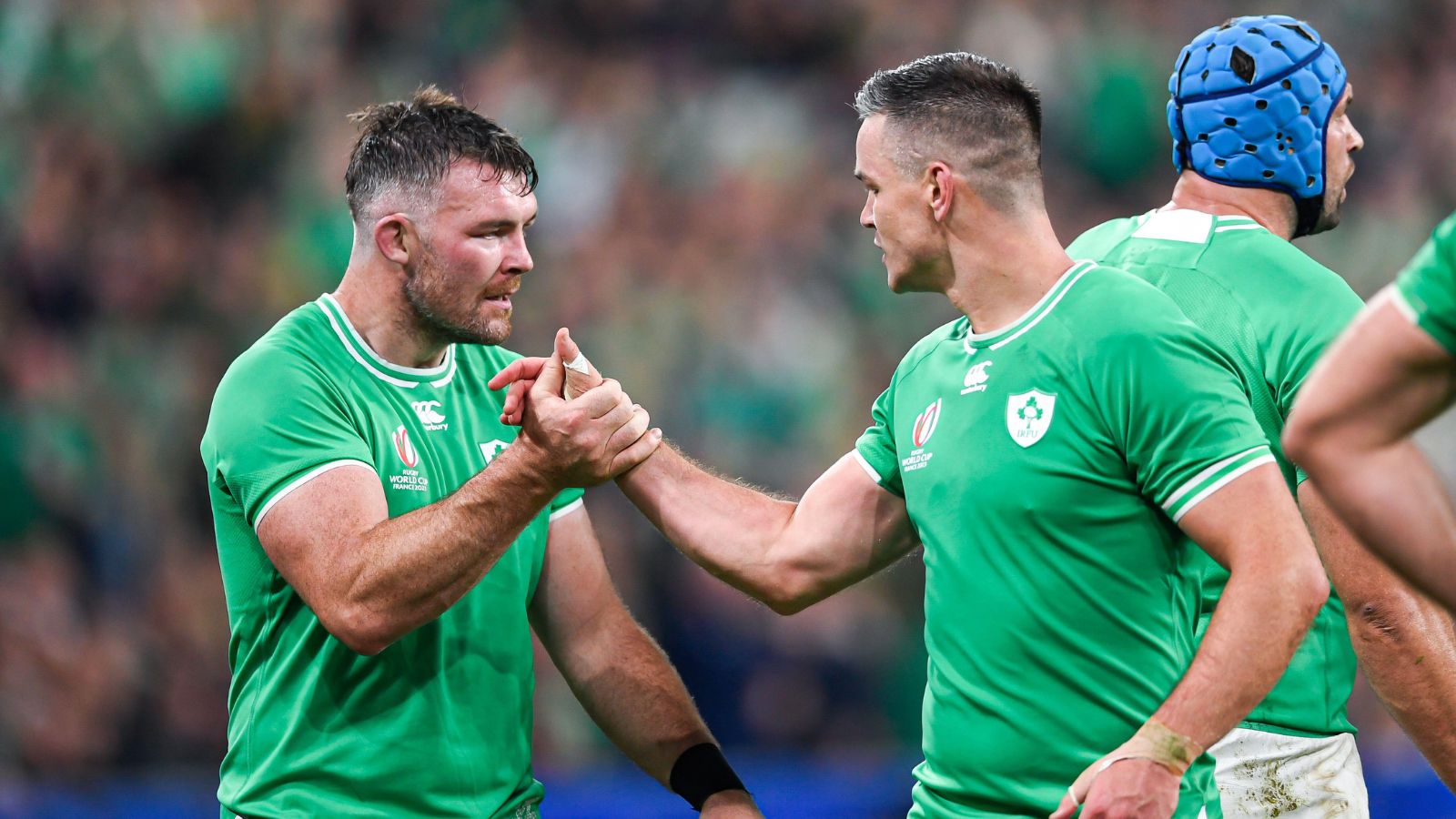 Ireland players Johnny Sexton and Peter O'Mahony shake hangds during the Rugby World Cup match between South Africa and Ireland at Stade de France in Saint-Denis near Paris