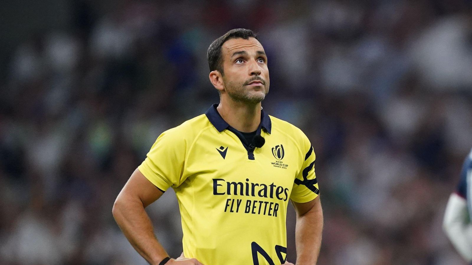 Referee Mathieu Raynal (left) waits for TMO review before a yellow card for England's Tom Curry (not pictured) during the 2023 Rugby World Cup Pool D match at the Stade de Marseille