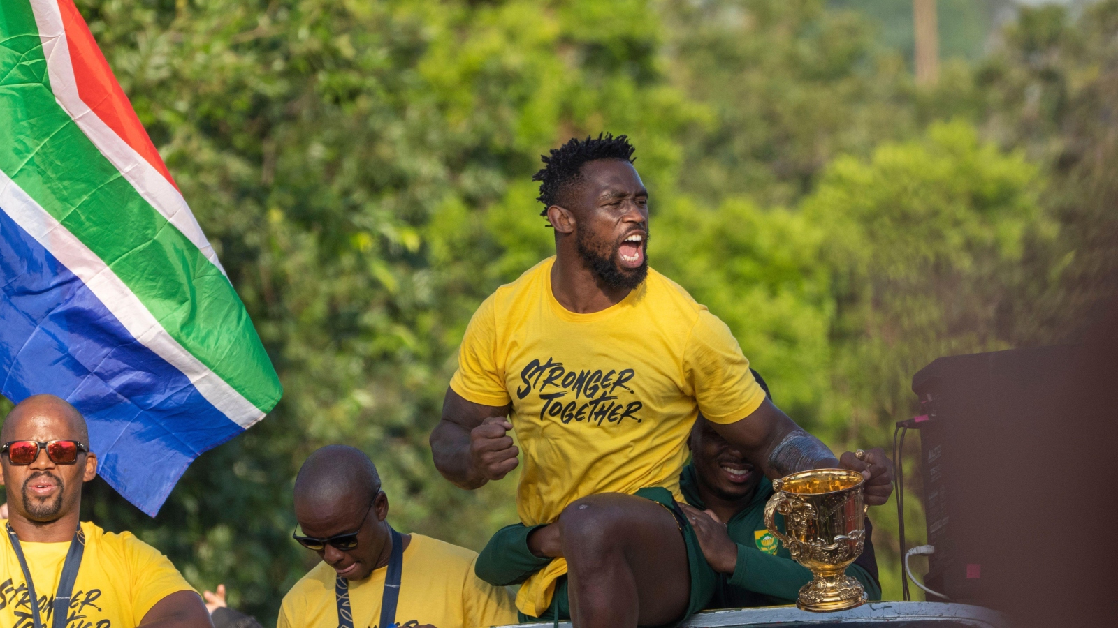 Springboks captain Siya Kolisi celebrates during a trophy parade.