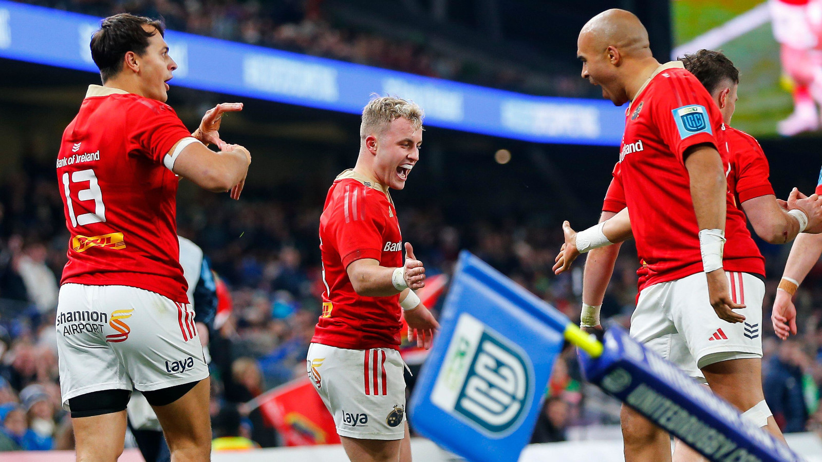 Munster celebrate Craig Casey's try against Leinster in the URC.