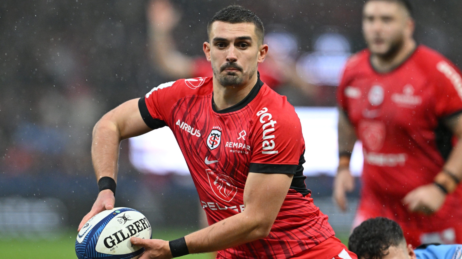 Thomas Ramos with ball in hand for Toulouse.