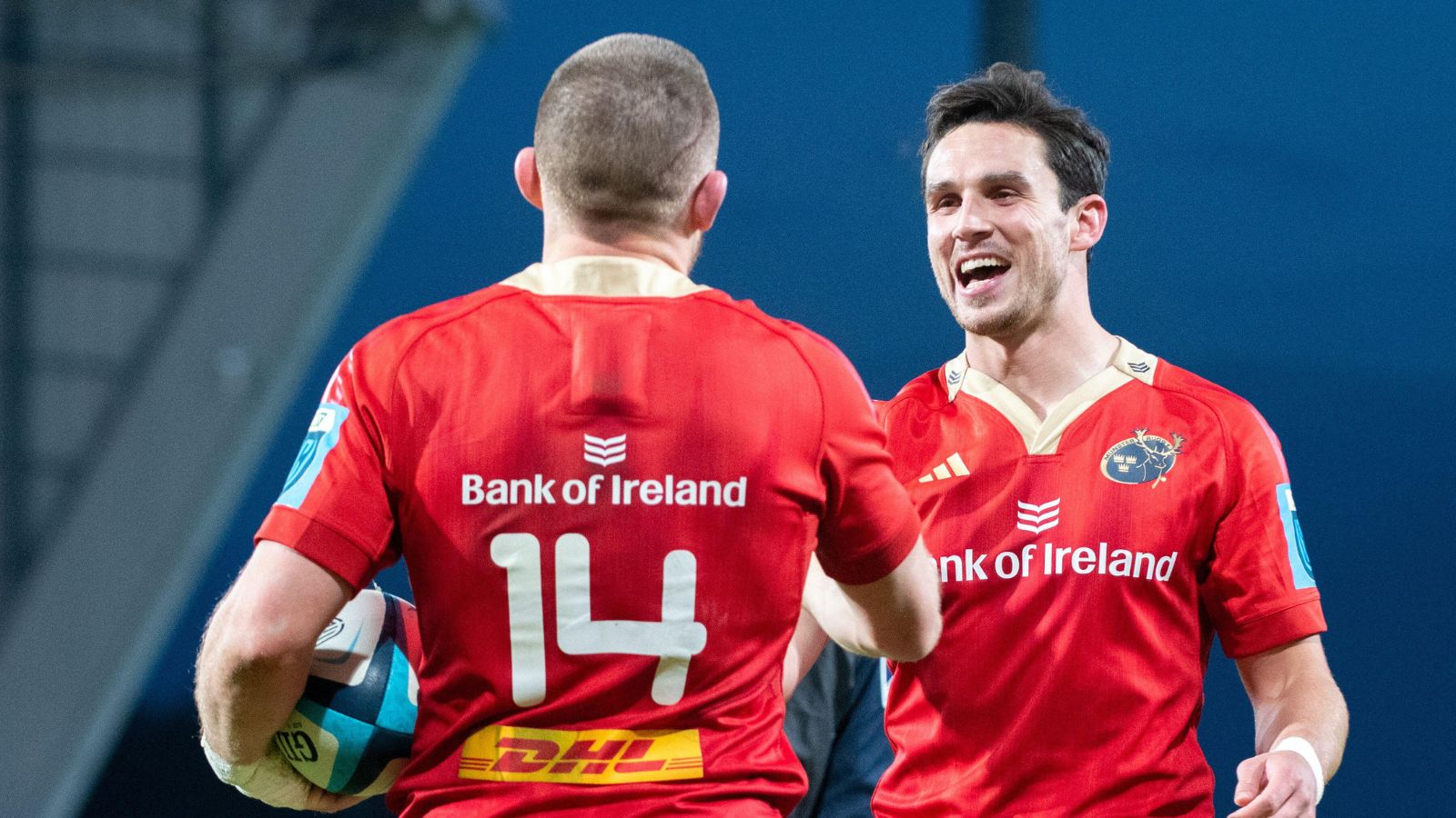 Andrew Conway of Munster celebrates scoring with Joey Carbery of Munster during the United Rugby Championship Round 1 match between Munster Rugby and Sharks at Thomond Park in Limerick, Ireland on October 21, 2023