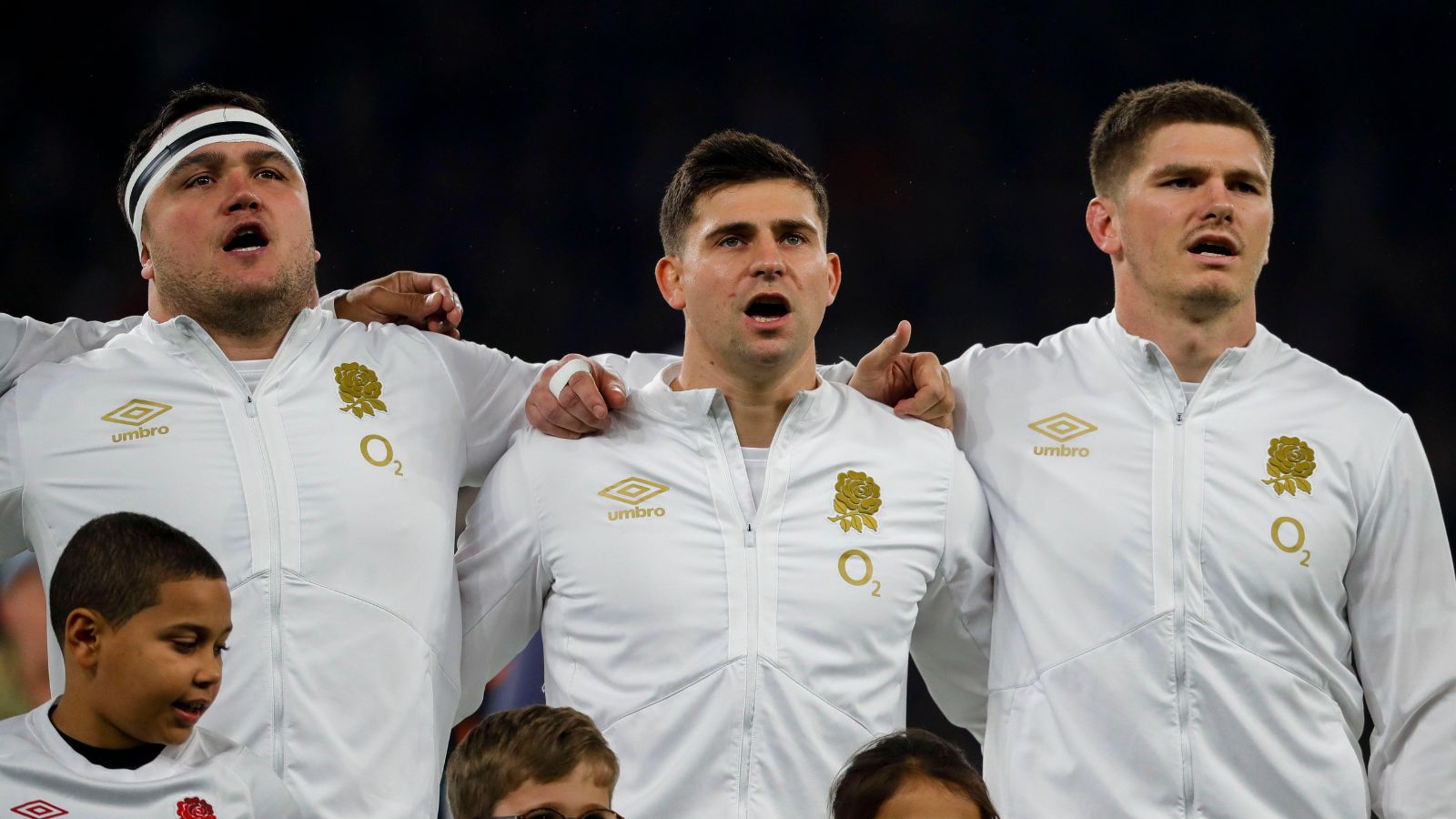 England's Jamie George, Ben Youngs and Owen Farrell during the anthems during the Autumn International match at Twickenham Stadium.