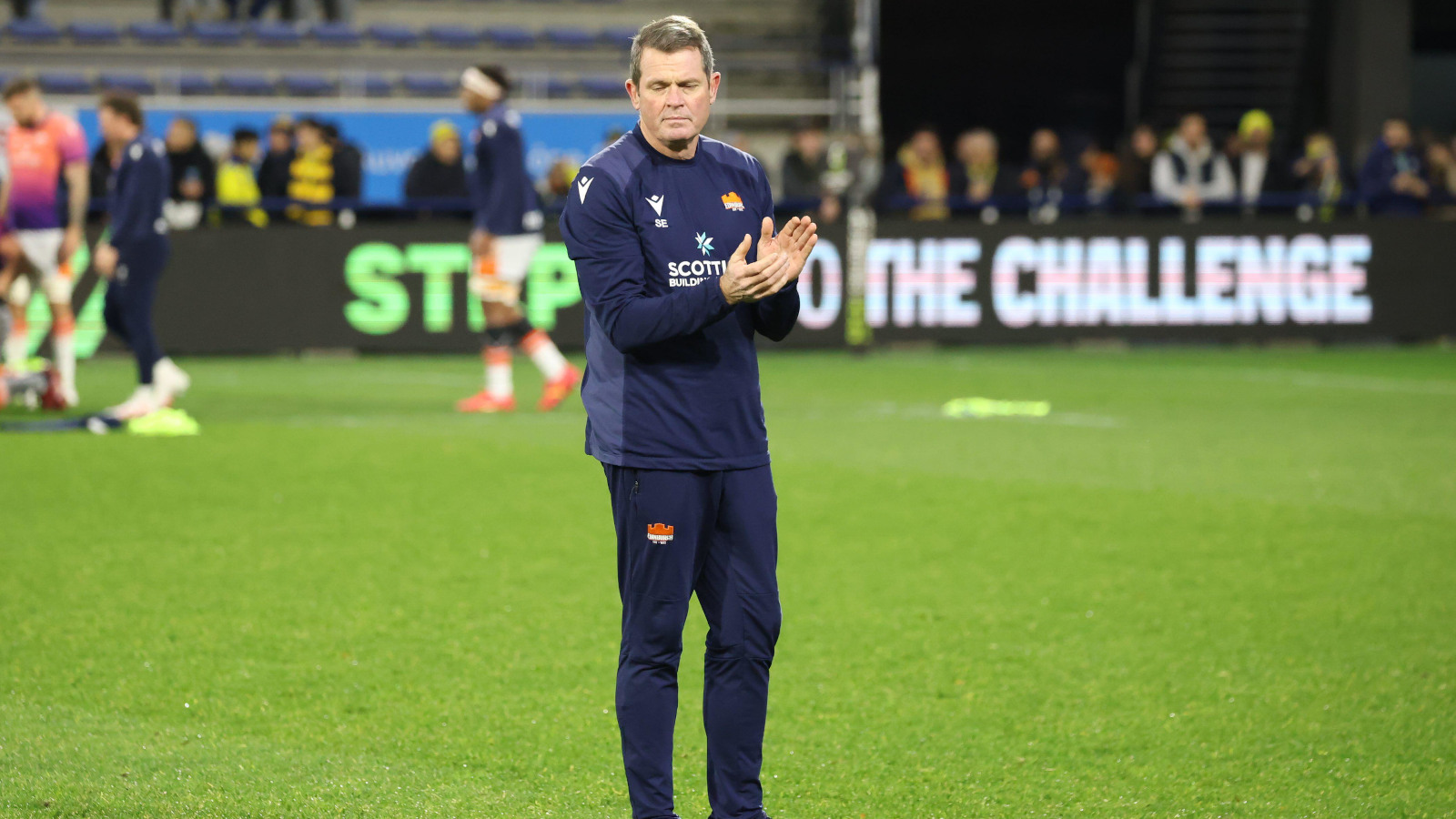 Edinburgh senior coach Sean Everitt rubbing hands.