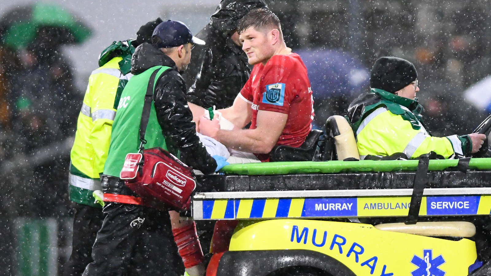 Munster back-row Jack O'Donoghue being stretchered off.