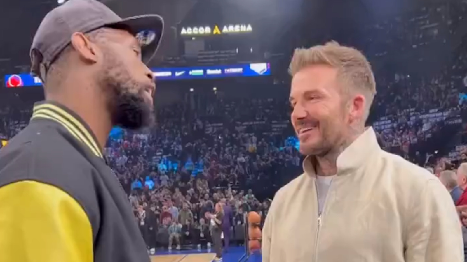 Springboks captain Siya Kolisi talks to David Beckham.