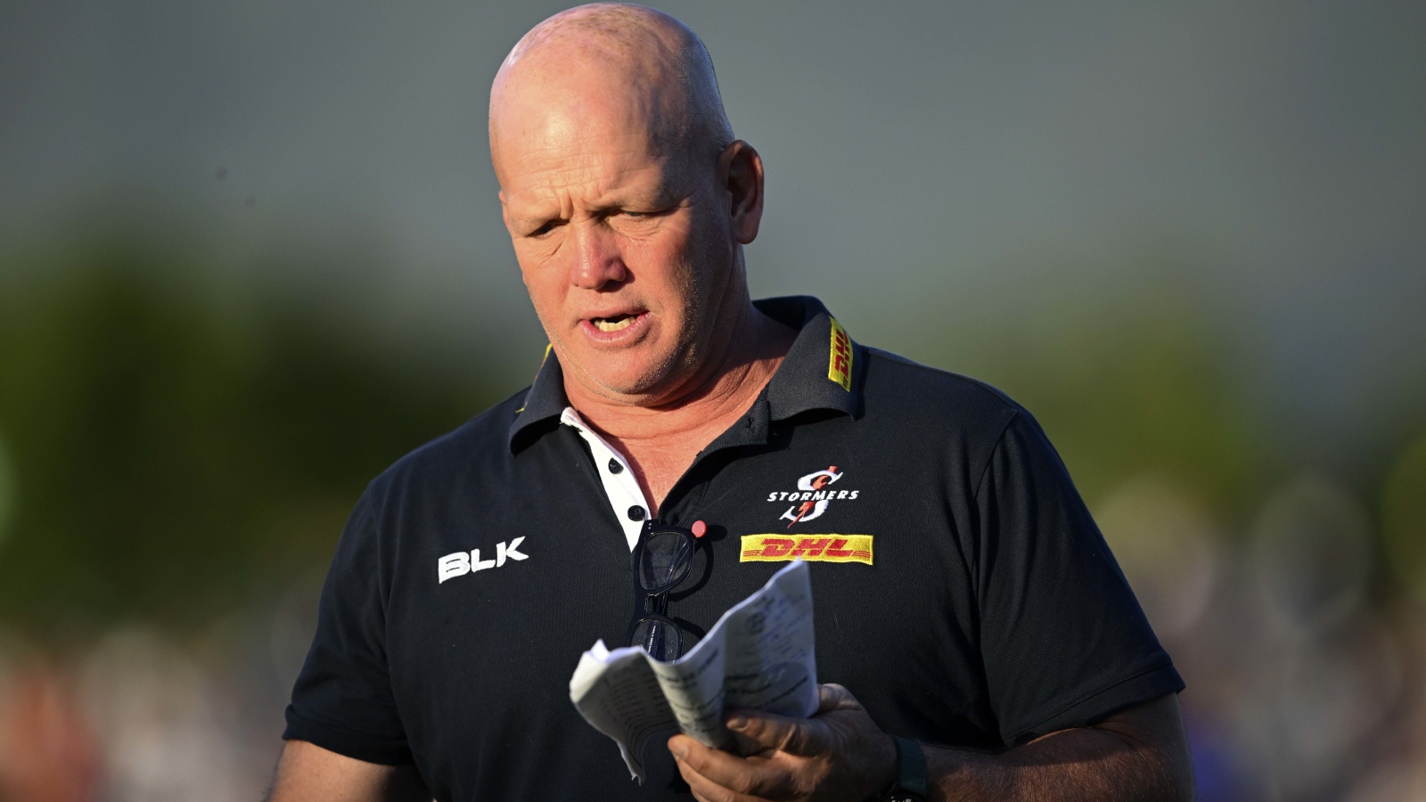 Stormers head coach John Dobson looks intently at his notes.