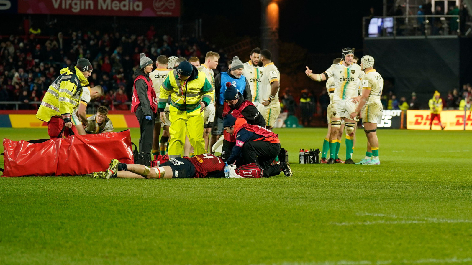 Munster second-row Thomas Ahern receives treatment in Northampton match.