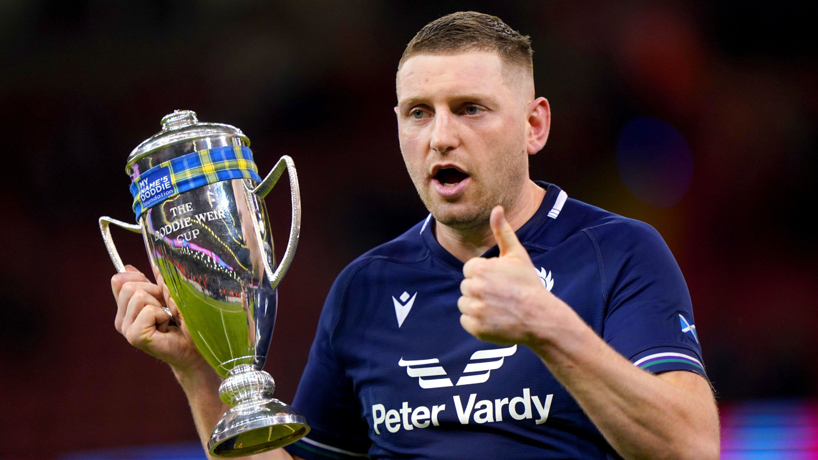 Finn Russell with the Doddie Weir Cup following 2024 Six Nations win over Wales.