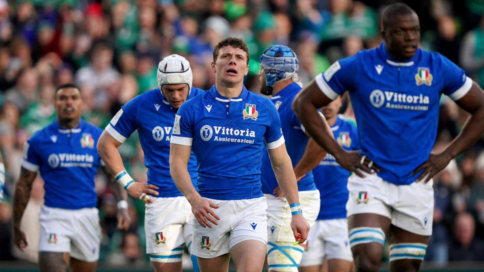 Italy fly-half Paolo Garbisi with his team-mates.