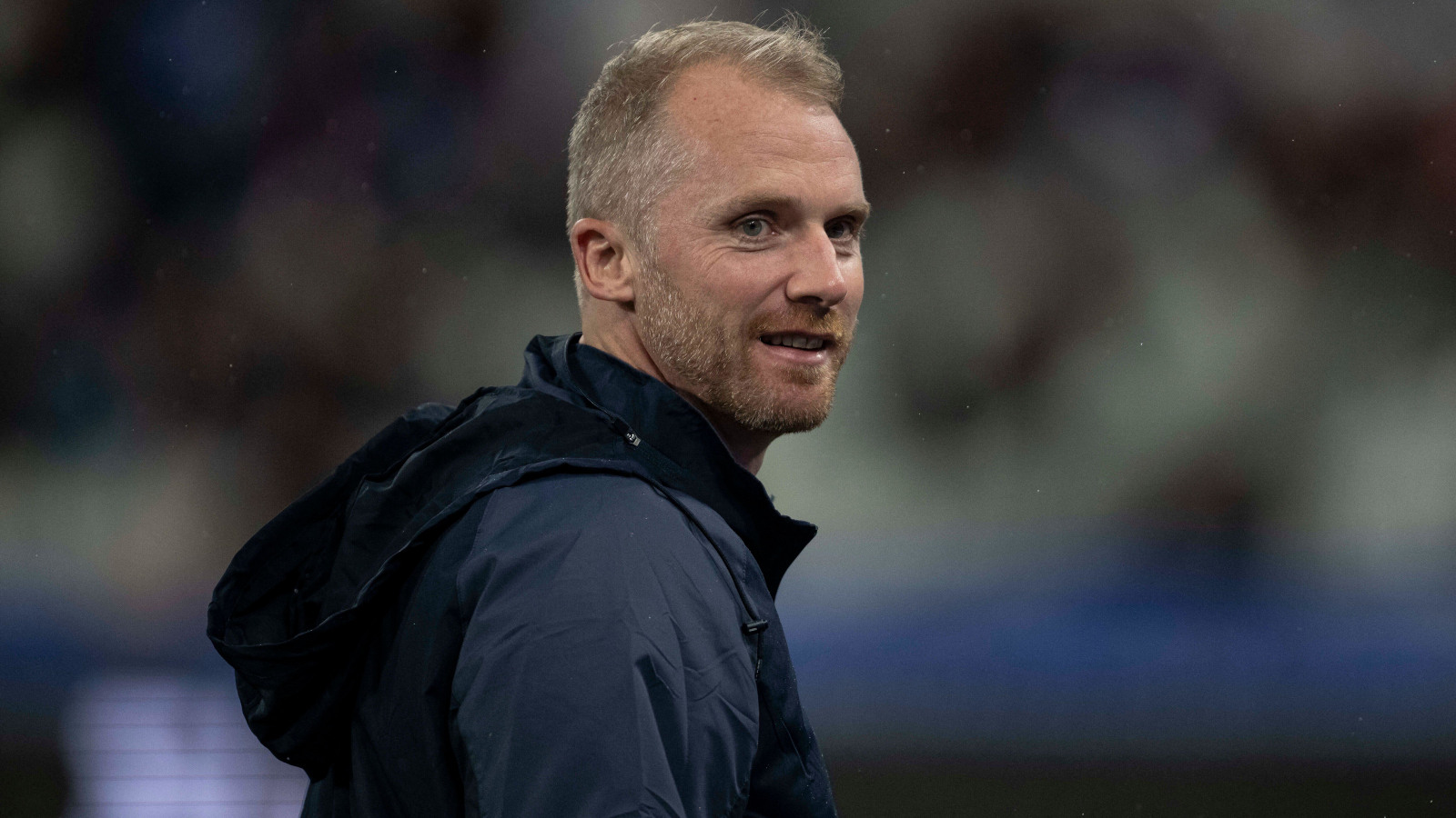 Former referee Wayne Barnes smiling.