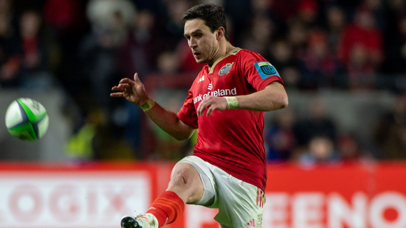 Munster fly-half Joey Carbery kicking.