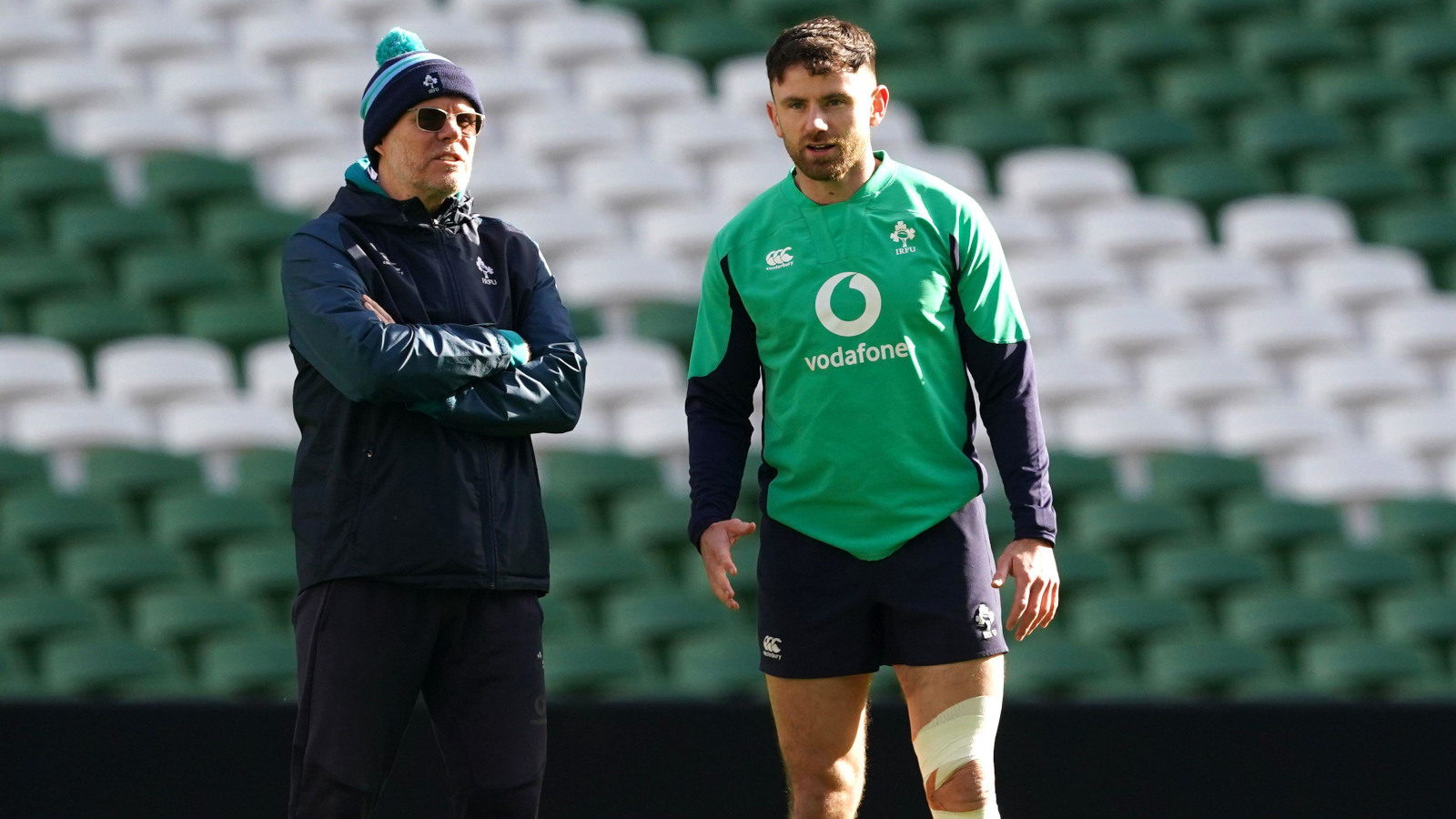 Ireland physio Einar Einarsson alongside full-back Hugo Keenan.