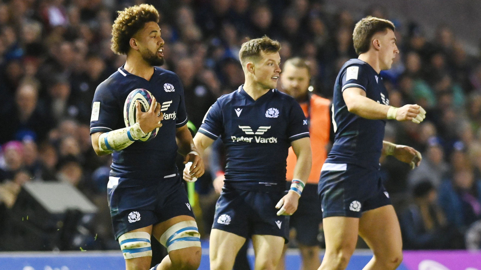 Andy Christie, George Horne and Cameron Redpath in action for Scotland against England 2024.