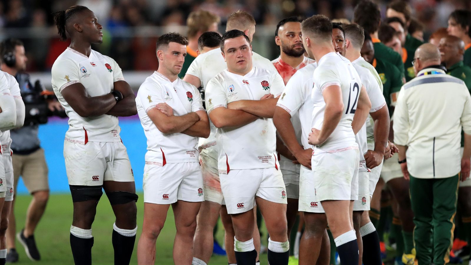 England's George Ford (centre left) and Jamie George (centre right) appear dejected after losing to South Africa in the 2019 Rugby World Cup final match at Yokohama Stadium.