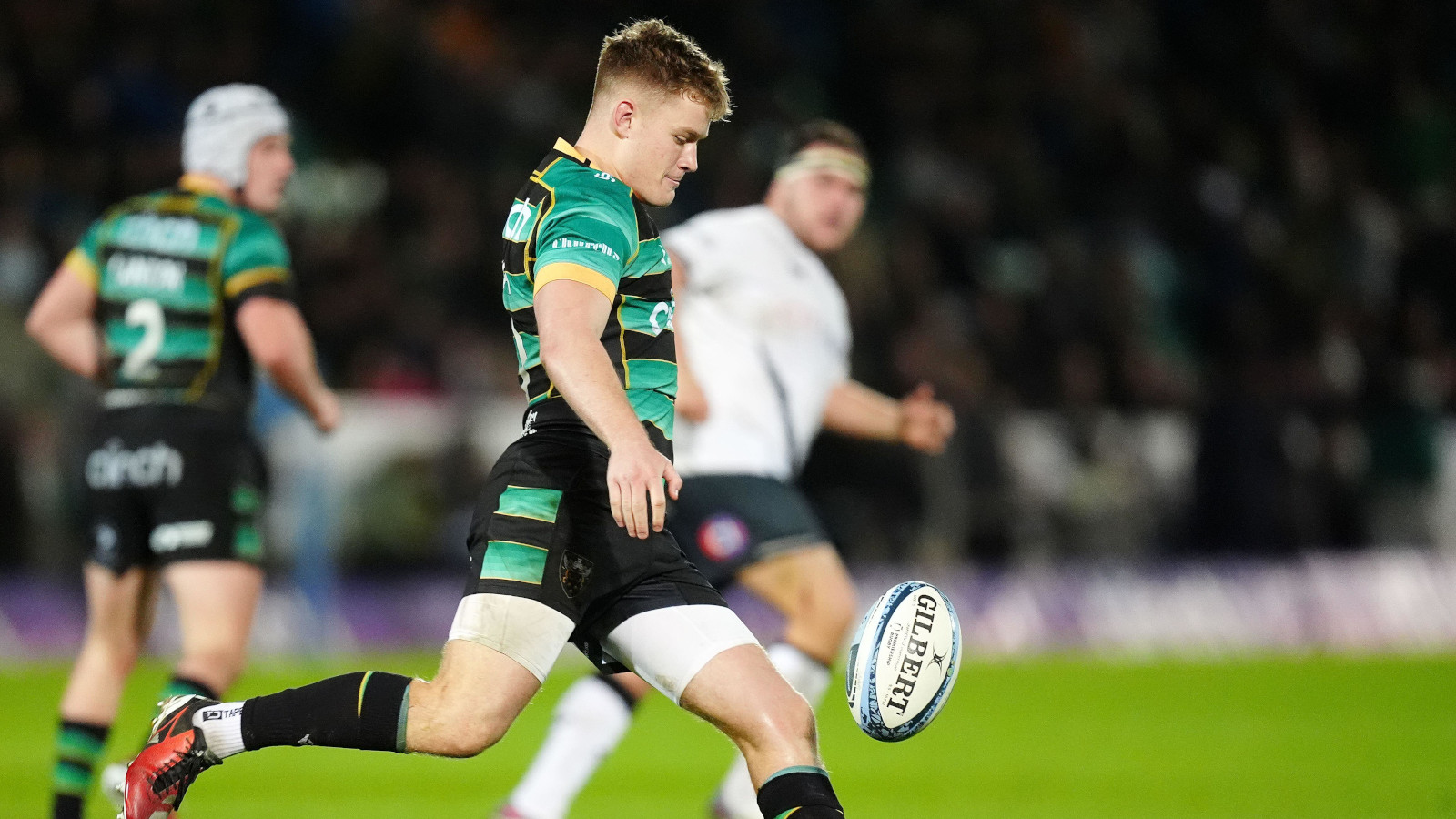 Fin Smith in action for Northampton Saints against Saracens in the Premiership in 2024.