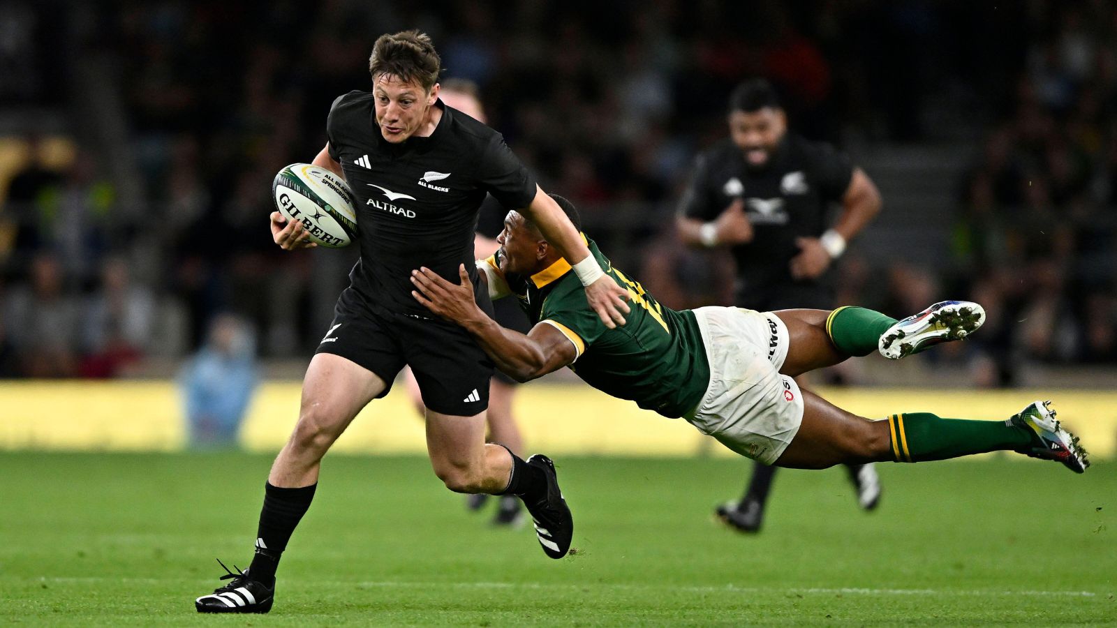 All Blacks scrum-half Cam Roigard in action for New Zealand in the Test match against South Africa's Springboks at Twickenham Stadium.