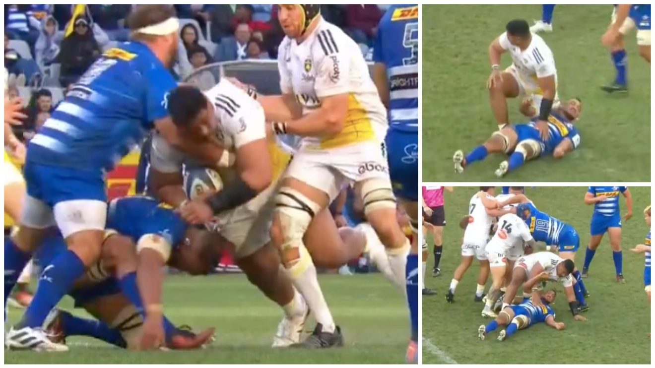 La Rochelle's Will Skelton protects opponent from other players.