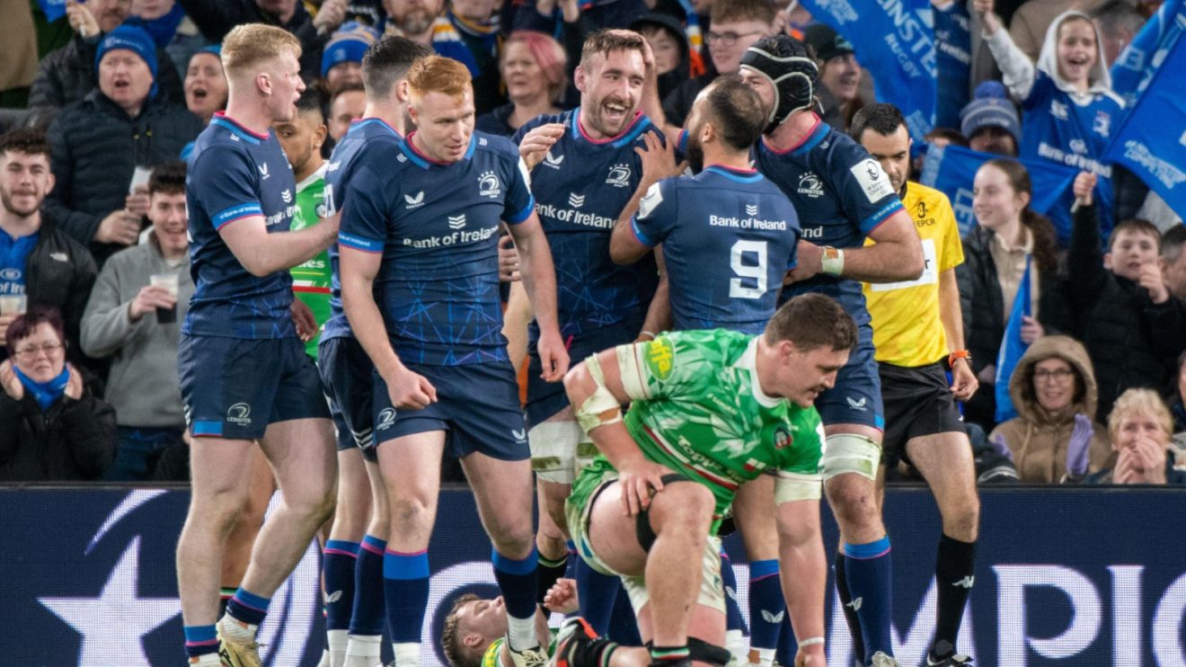 Leinster players celebrate against Leicester Tigers.