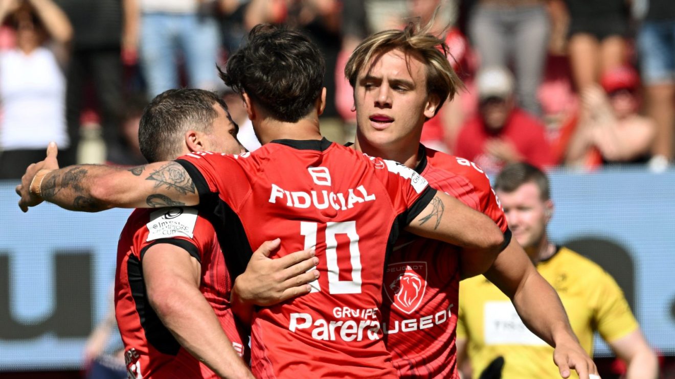 Toulouse players celebrate a try.