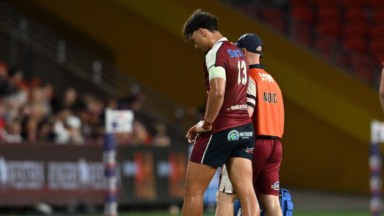 Reds star Jordan Petaia leaves the field injured.