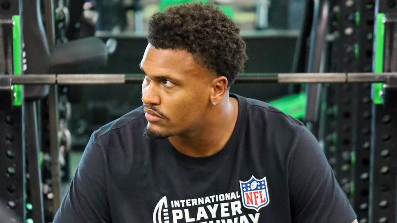 Travis Clayton on a weights bench.