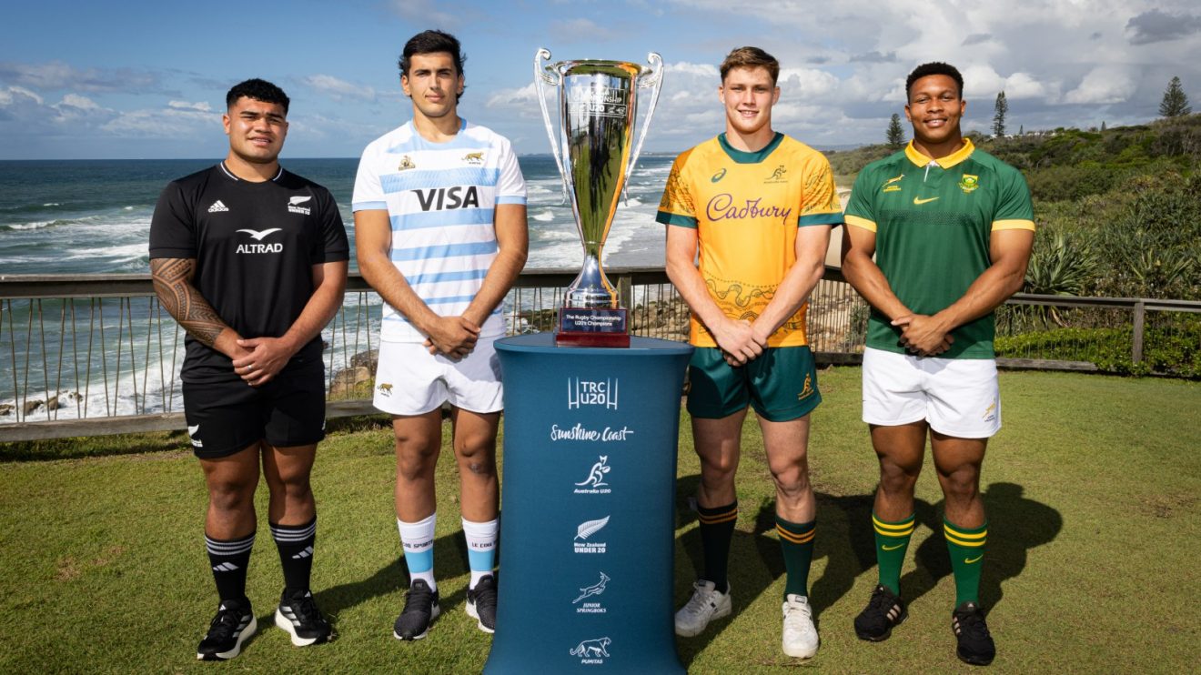 U20 stars from New Zealand, Argentina, Australia and South Africa with Rugby Championship trophy.