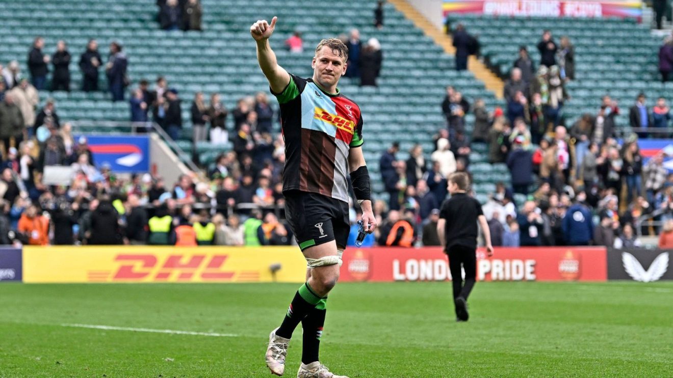 Alex Dombrandt (Harlequins) waves to the crowd at the end of the game
