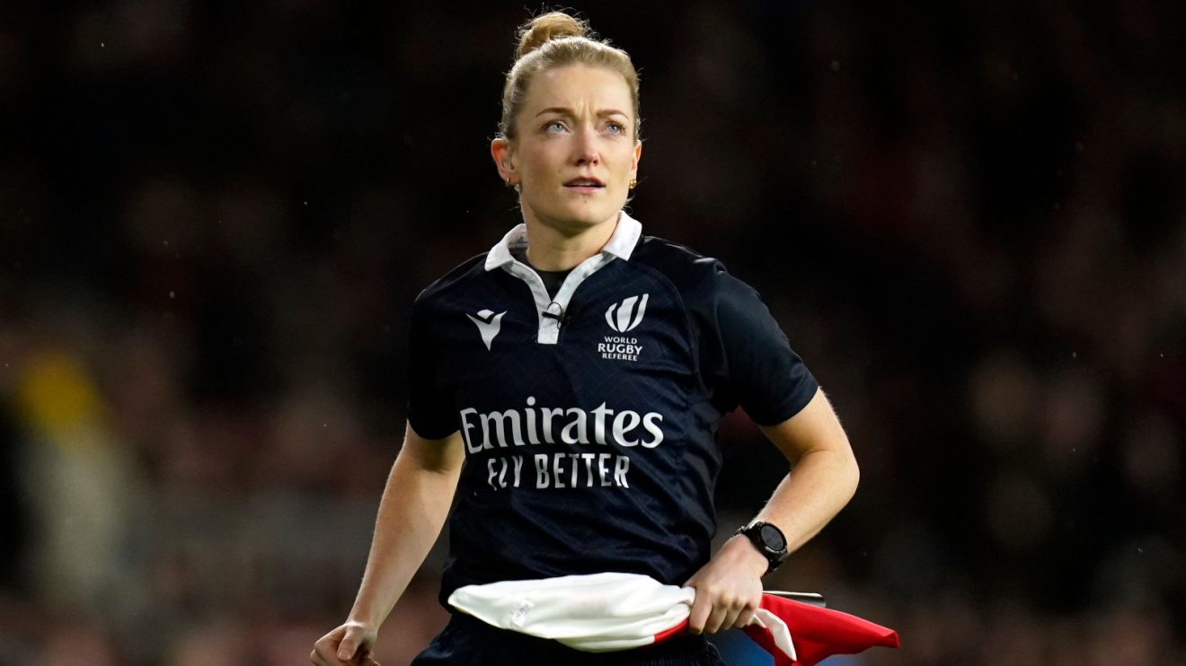Hollie Davidson as an assistant referee.