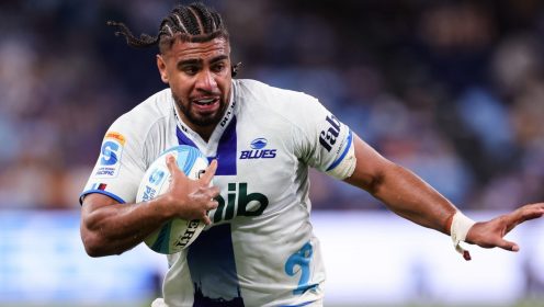 Hoskins Sotutu on the charge for the Blues.