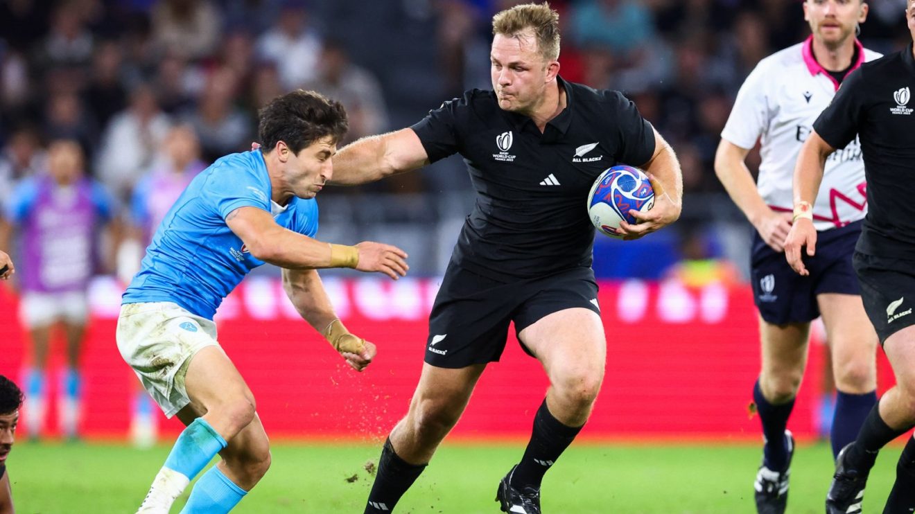 All Black Sam Cane with ball in hand.