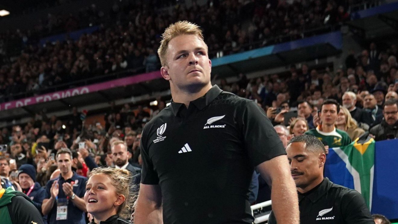 New Zealand captain Sam Cane walk out past the Webb Ellis Cup before the Rugby World Cup 2023 final match at the Stade de France in Paris, France.