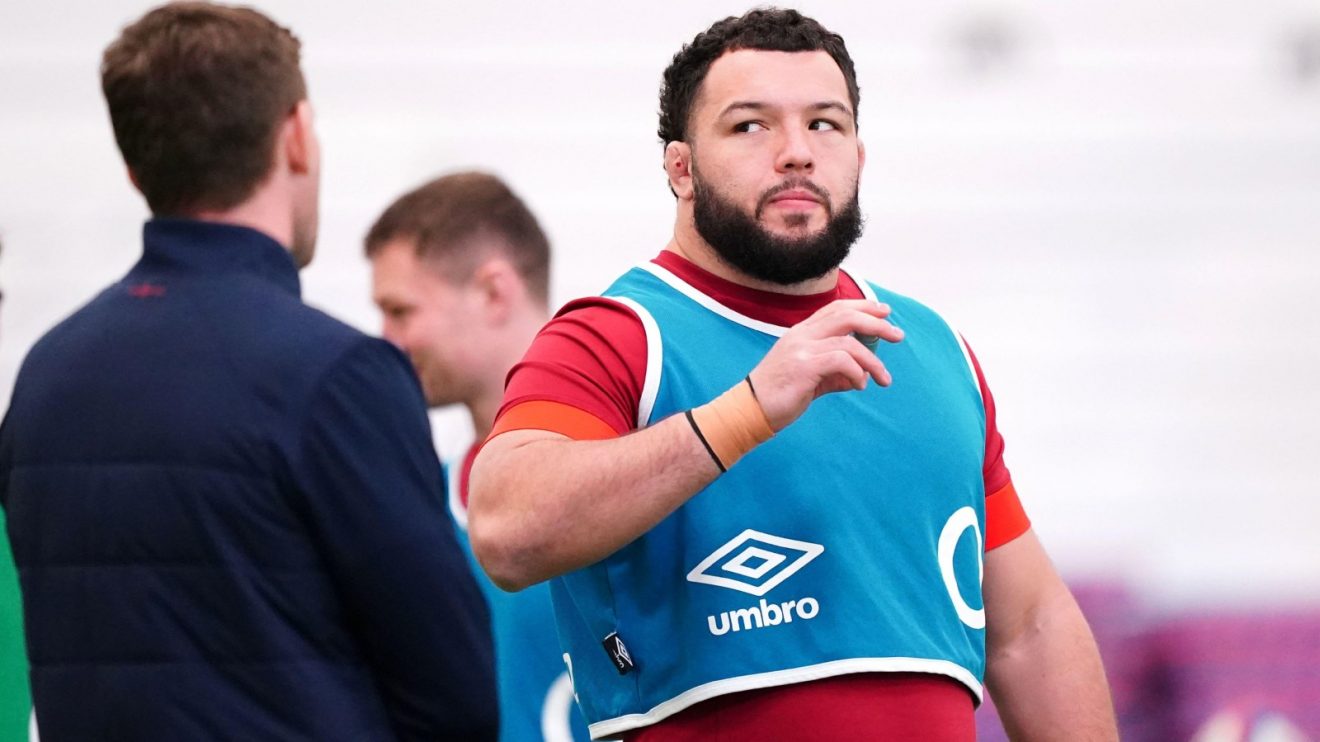 England prop Ellis Genge looks on.