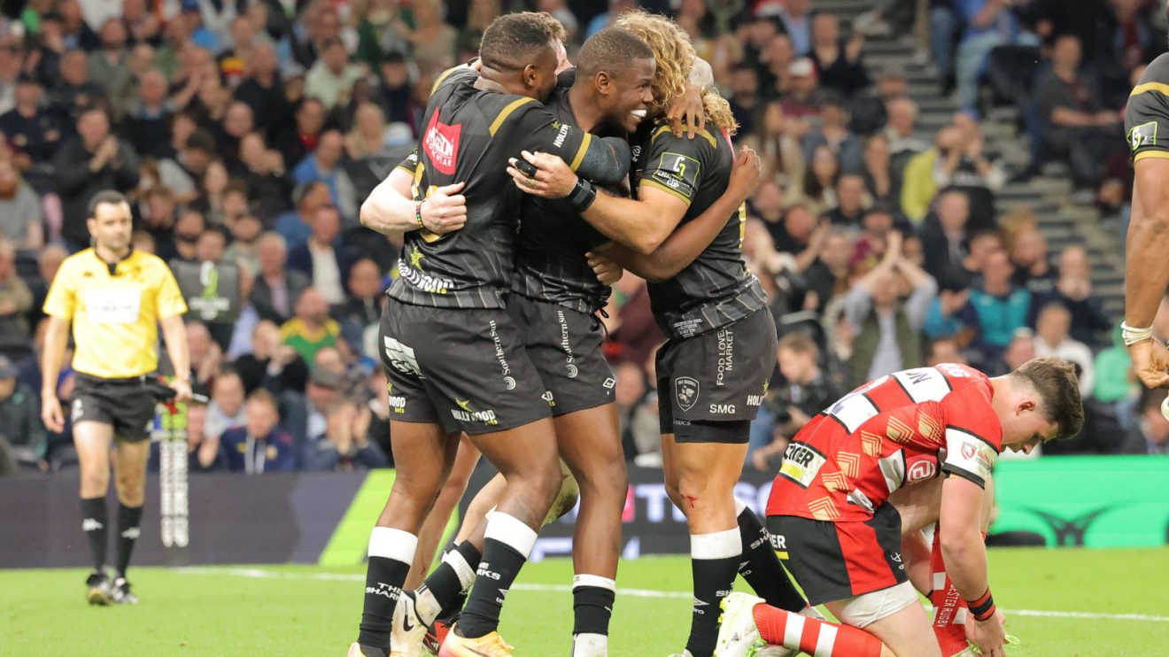 Sharks celebrate Aphelele Fassi's try v Gloucester in the 2024 Challenge Cup final.