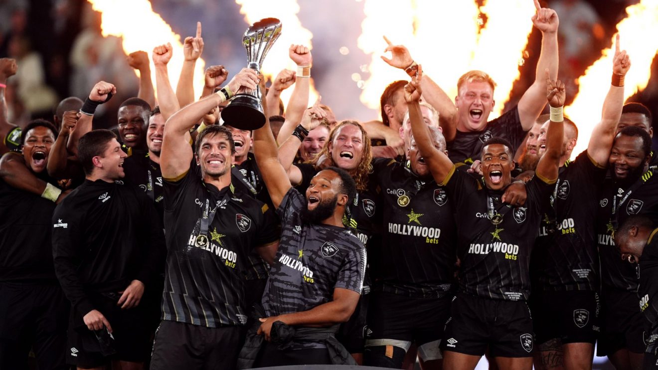 Sharks lift Challenge Cup trophy.