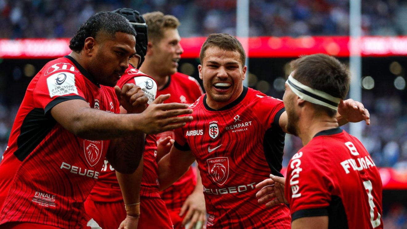 Toulouse captain Antoine Dupont celebrates with Peato Mauvaka and Alexandre Roumat after the Investec Champions Cup Final between Leinster and Stade Toulousain.