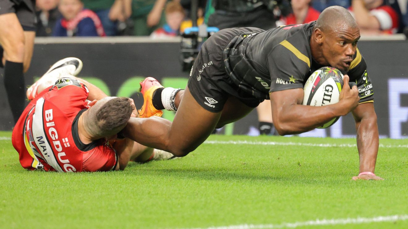 Jonny May tackling Mazakole Mapimpi during the 2024 Challenge Cup final.