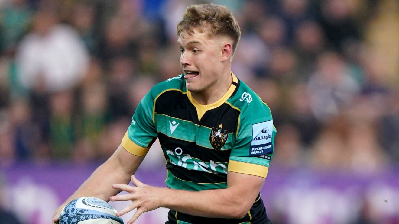 Fin Smith in action for Northampton Saints.