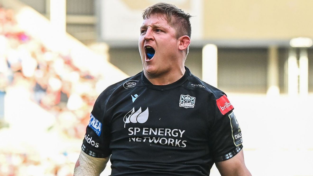 Glasgow Warriors hooker Johnny Matthews celebrates a try.