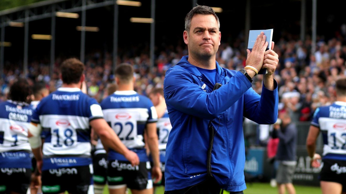 Bath head of rugby Johann van Graan claps fans.