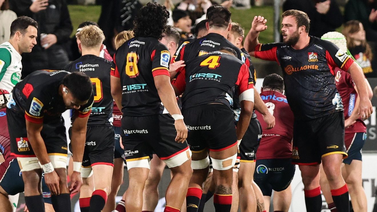 Chiefs players celebrate a try v Reds SRPQF 2024 - Alamy.jpg