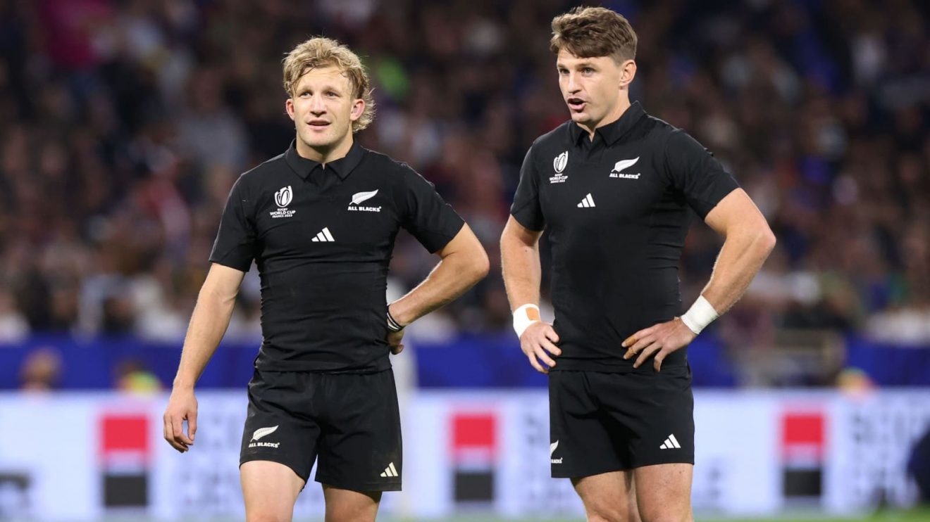 Damian McKenzie and Beauden Barrett in action during the 2023 Rugby World Cup.