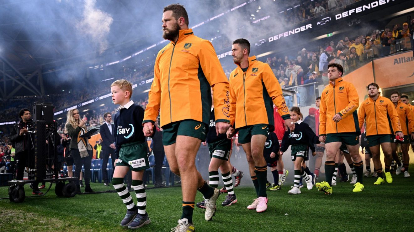 James Slipper leads out the Wallabies.