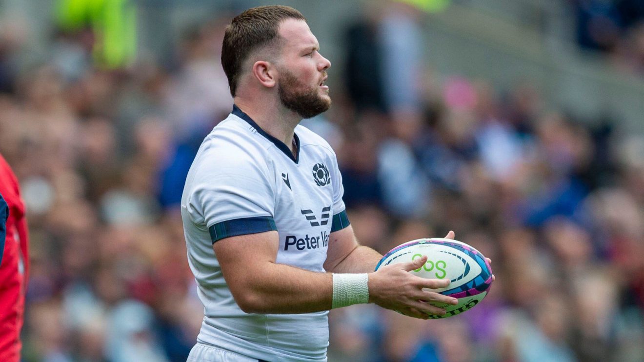 Ewan Ashman in action for Scotland.